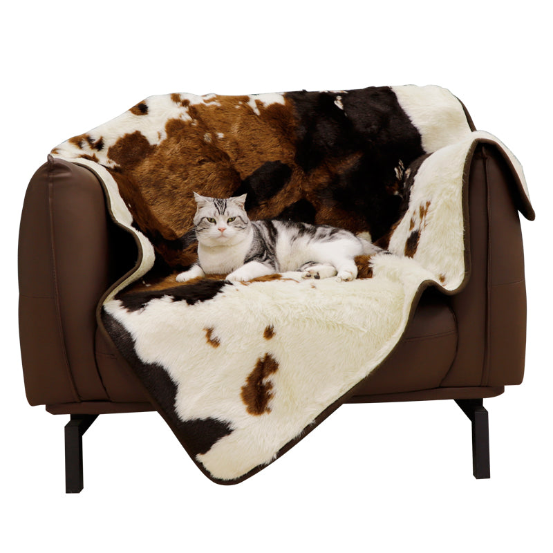 Irregular patches of waterproof faux fur throw blanket