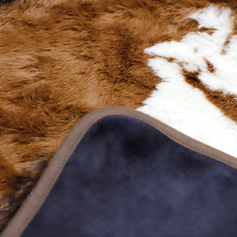 Irregular patches of waterproof faux fur throw blanket