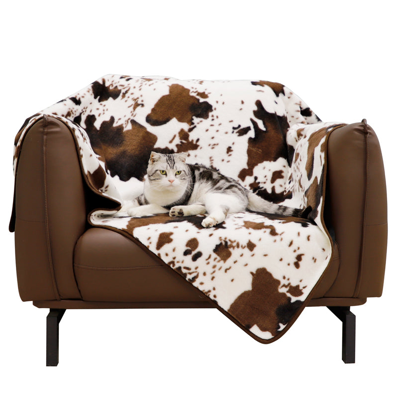 Irregular patches of waterproof faux fur throw blanket