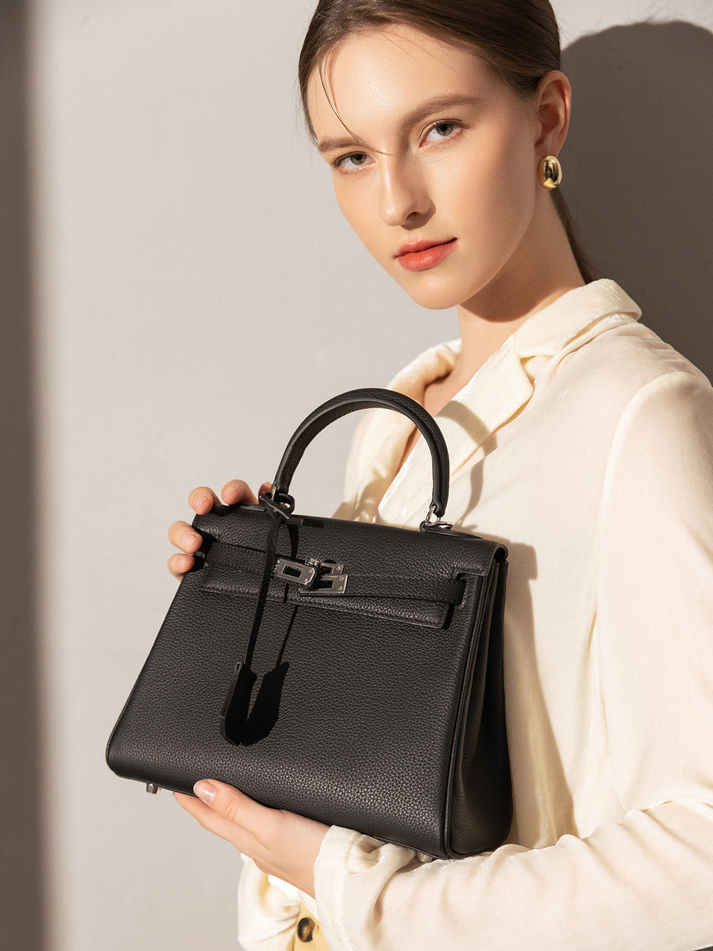 Queens Mini Top Handle Leather Bag