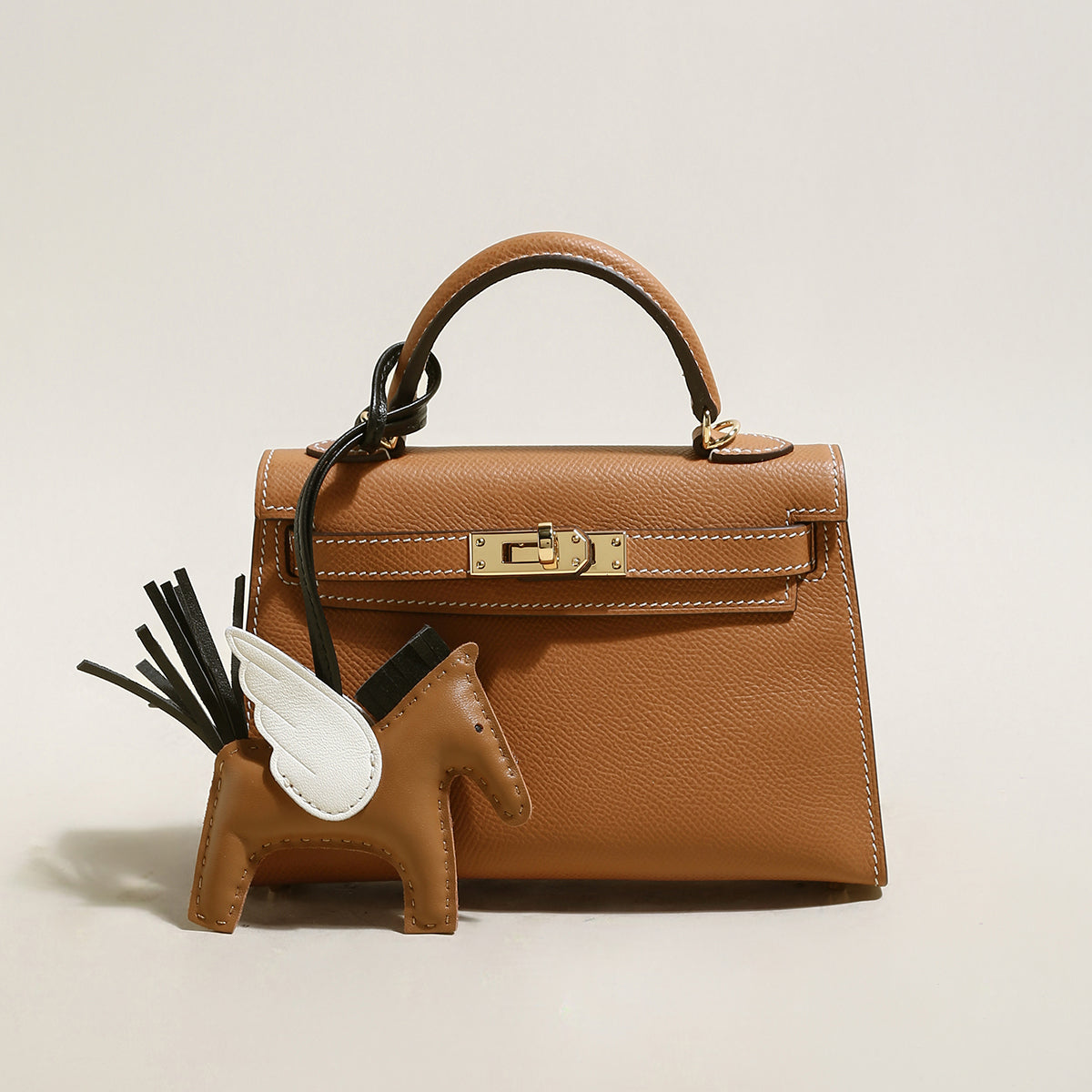 Trendy Petite Top Handle Bag with a Horse Charm