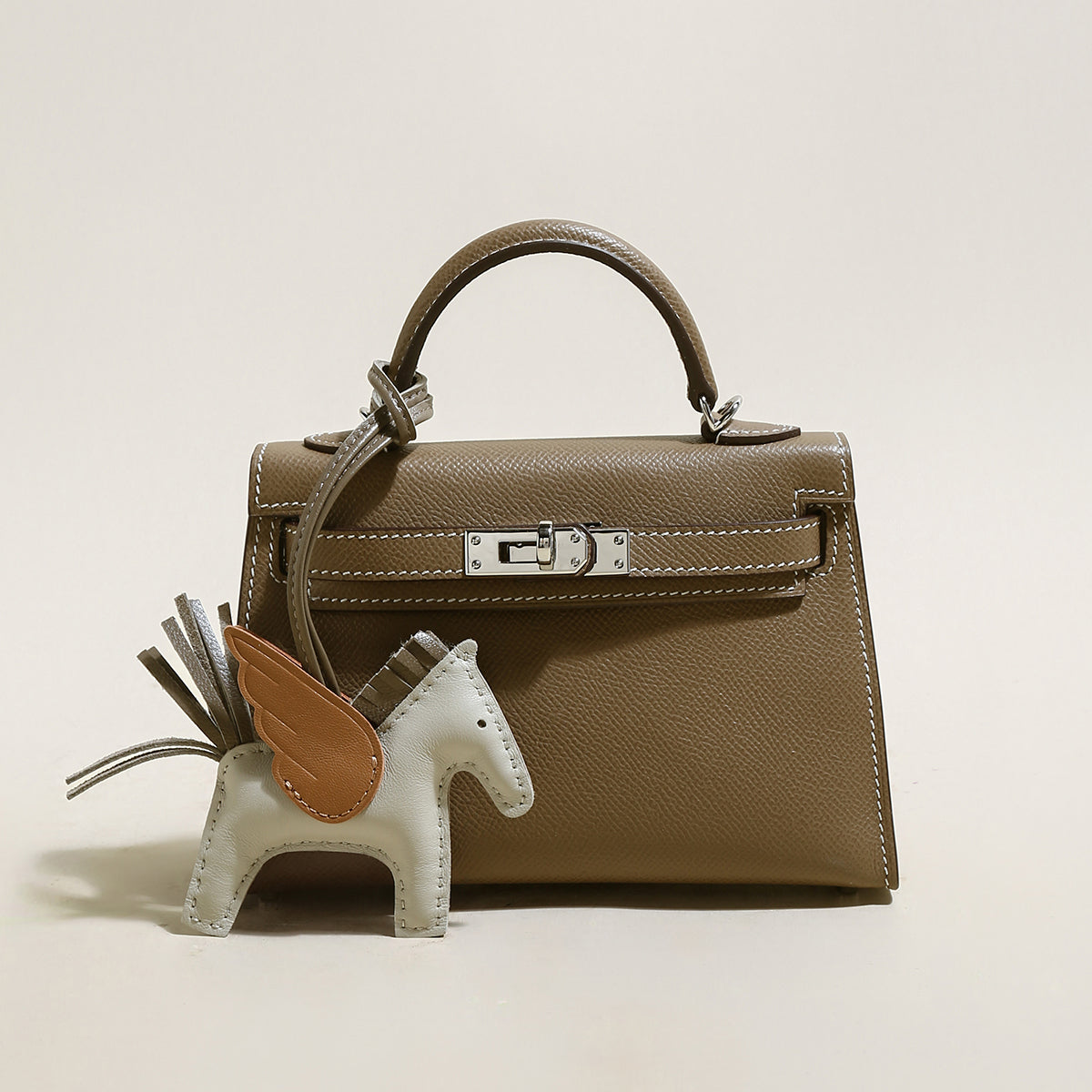 Trendy Petite Top Handle Bag with a Horse Charm