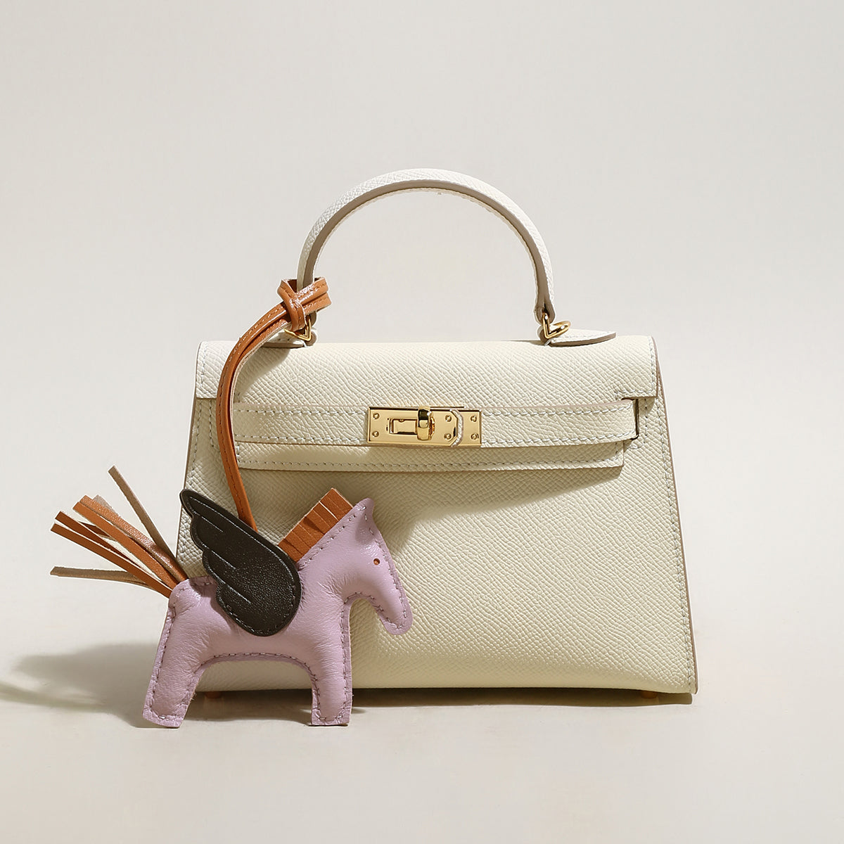 Trendy Petite Top Handle Bag with a Horse Charm